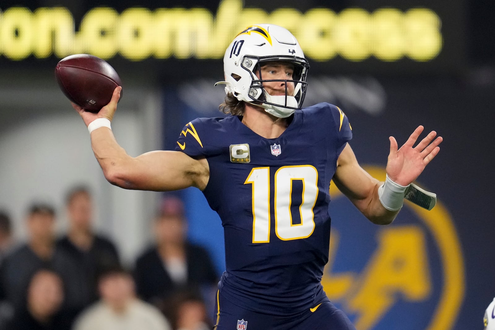 Los Angeles Chargers quarterback Justin Herbert (10) throws a pass during the first half of an NFL football game against the Baltimore Ravens, Monday, Nov. 25, 2024, in Inglewood, Calif. (AP Photo/Eric Thayer)