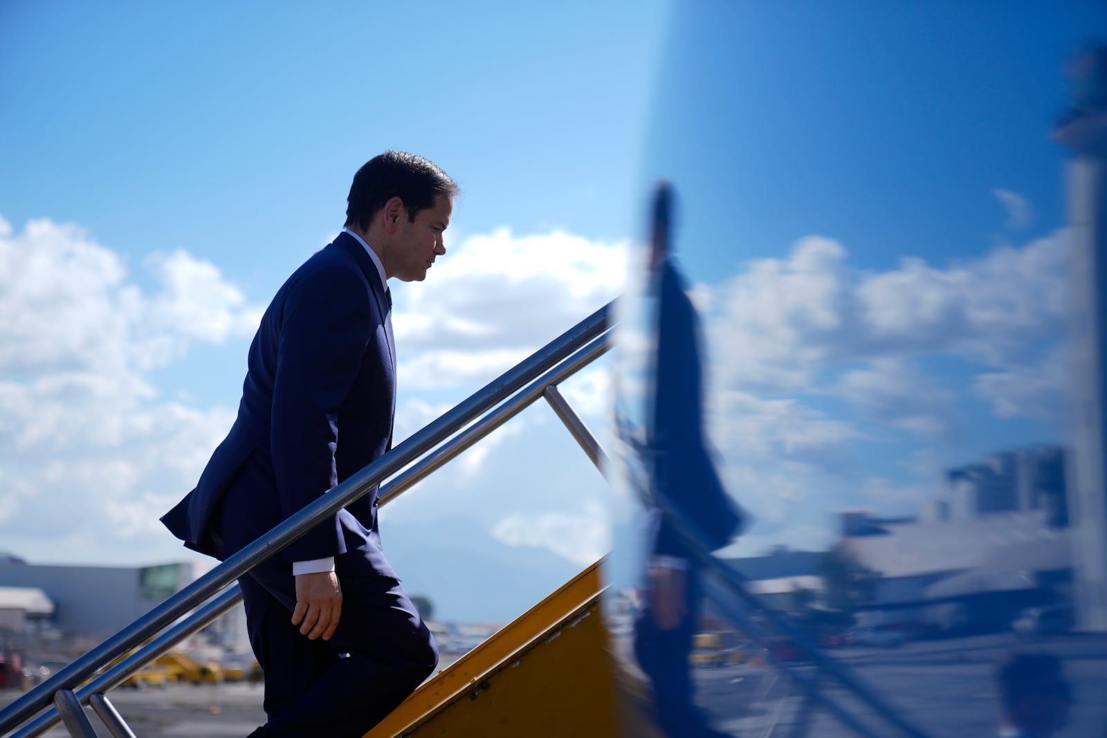 Secretary of State Marco Rubio boards a plane at La Aurora International Airport in Guatemala City, Wednesday, Feb. 5, 2025, en route to the Dominican Republic. (AP Photo/Mark Schiefelbein, Pool)