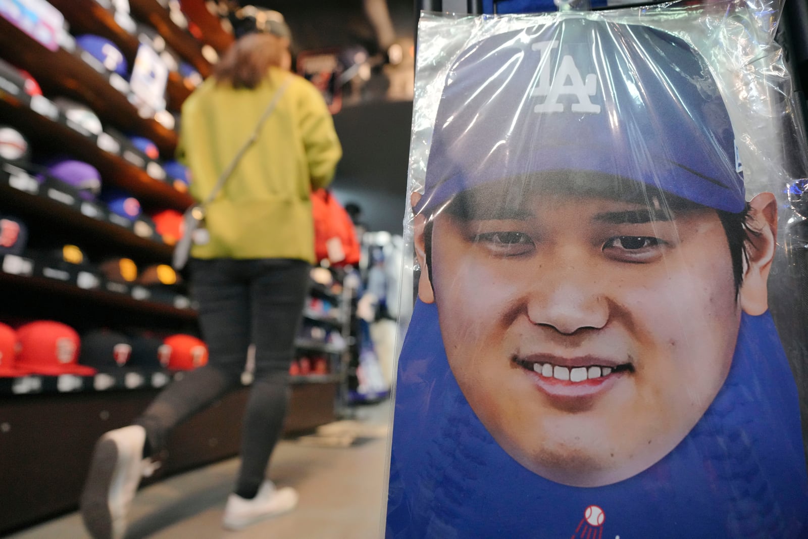 Goods related to Shohei Ohtani of the Los Angeles Dodgers are displayed at a sporting goods store, "SELECTION," in Shinjuku district Wednesday, Oct. 23, 2024 in Tokyo. (AP Photo/Eugene Hoshiko)