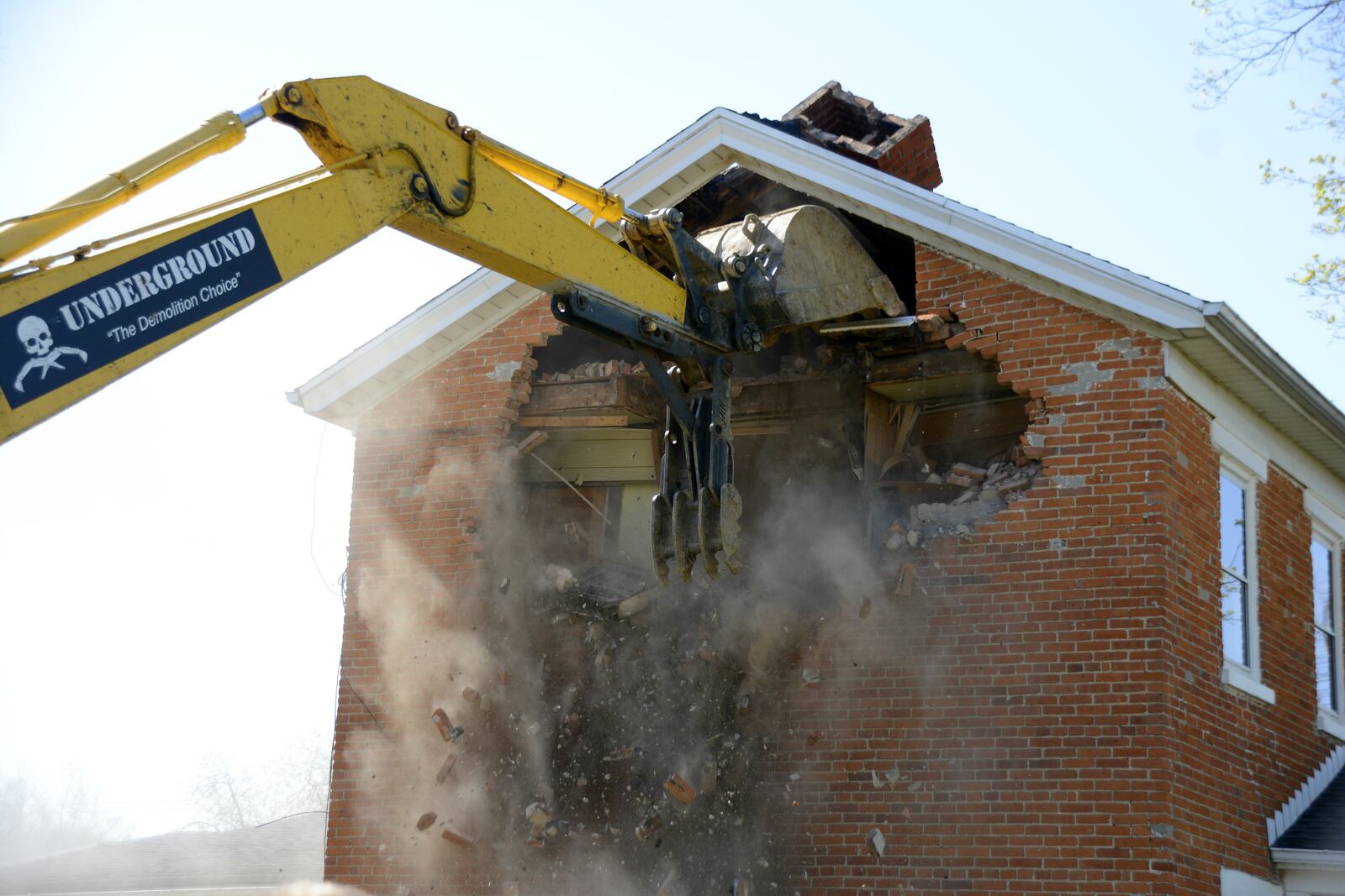 The Cooper House was razed Monday in Fairfield. The demolition cleared the way for the expansion of Marsh Park. 