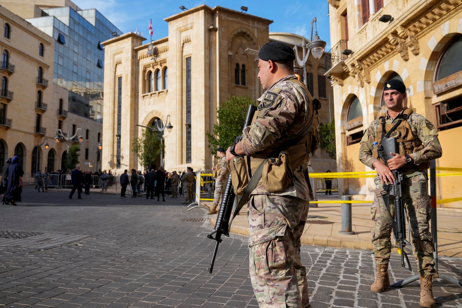 Lebanese army soldiers stand guard in front of the parliament building before a session to elect a new Lebanese president in down town Beirut, Lebanon, Thursday, Jan. 9, 2025. (AP Photo/Hussein Malla)