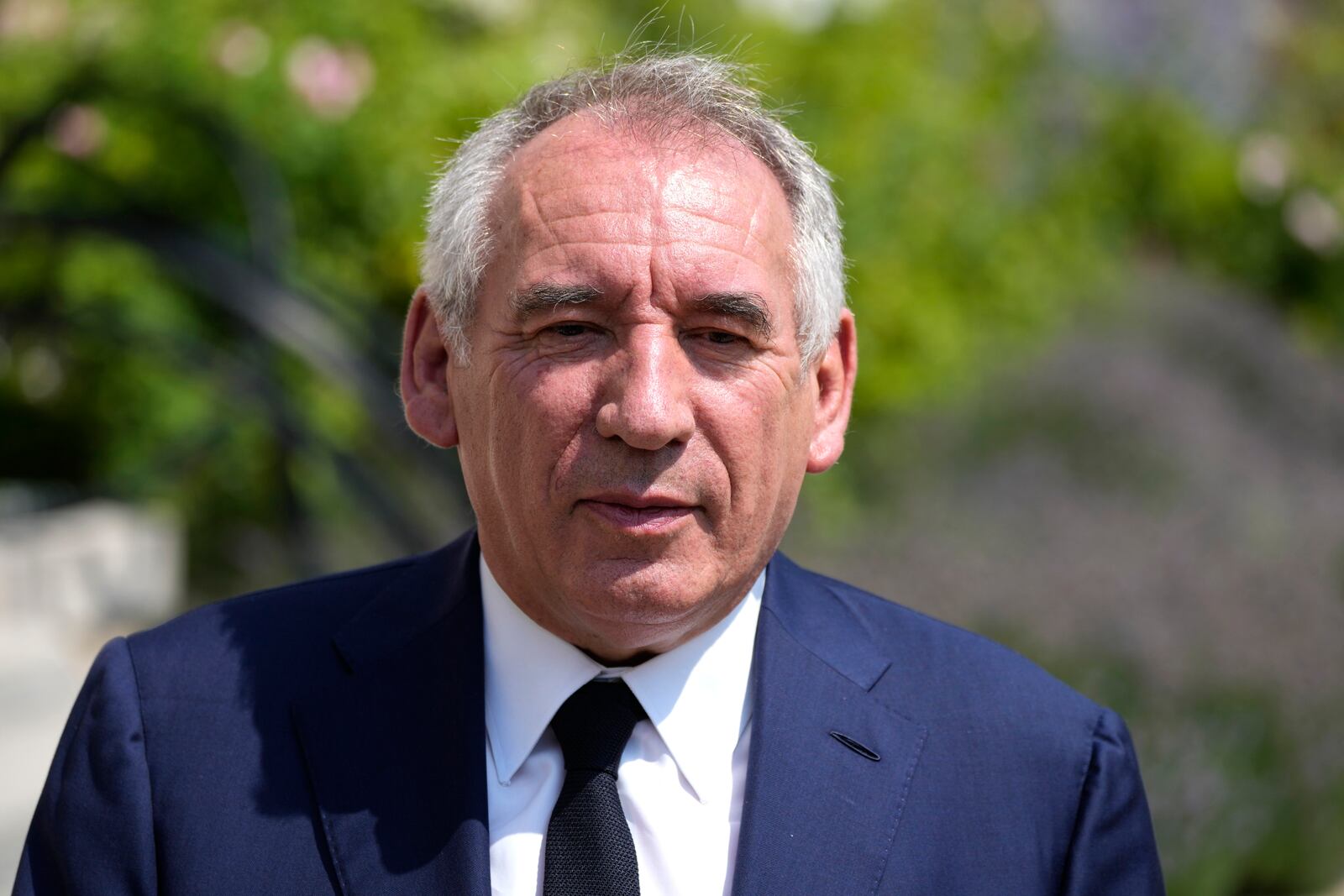 FILE - French centrist party MoDem (Mouvement Democrate) leader Francois Bayrou speaks to reporters after a meeting with France's President Emmanuel Macron at the Elysee Palace, in Paris, France, Tuesday, June 21, 2022. French President Emmanuel Macron names key centrist ally François Bayrou as new prime minister Friday Dec.13 2024. (AP Photo/Francois Mori, File)