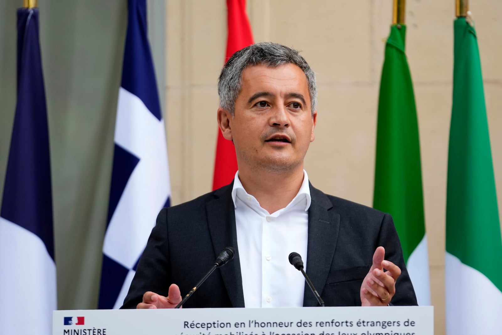 FILE - French Interior minister Gerald Darmanin acknowledges members of foreign police forces that help with the security of the 2024 Summer Olympics, Thursday, July 25, 2024, in Paris, France. (AP Photo/Petr David Josek, File)