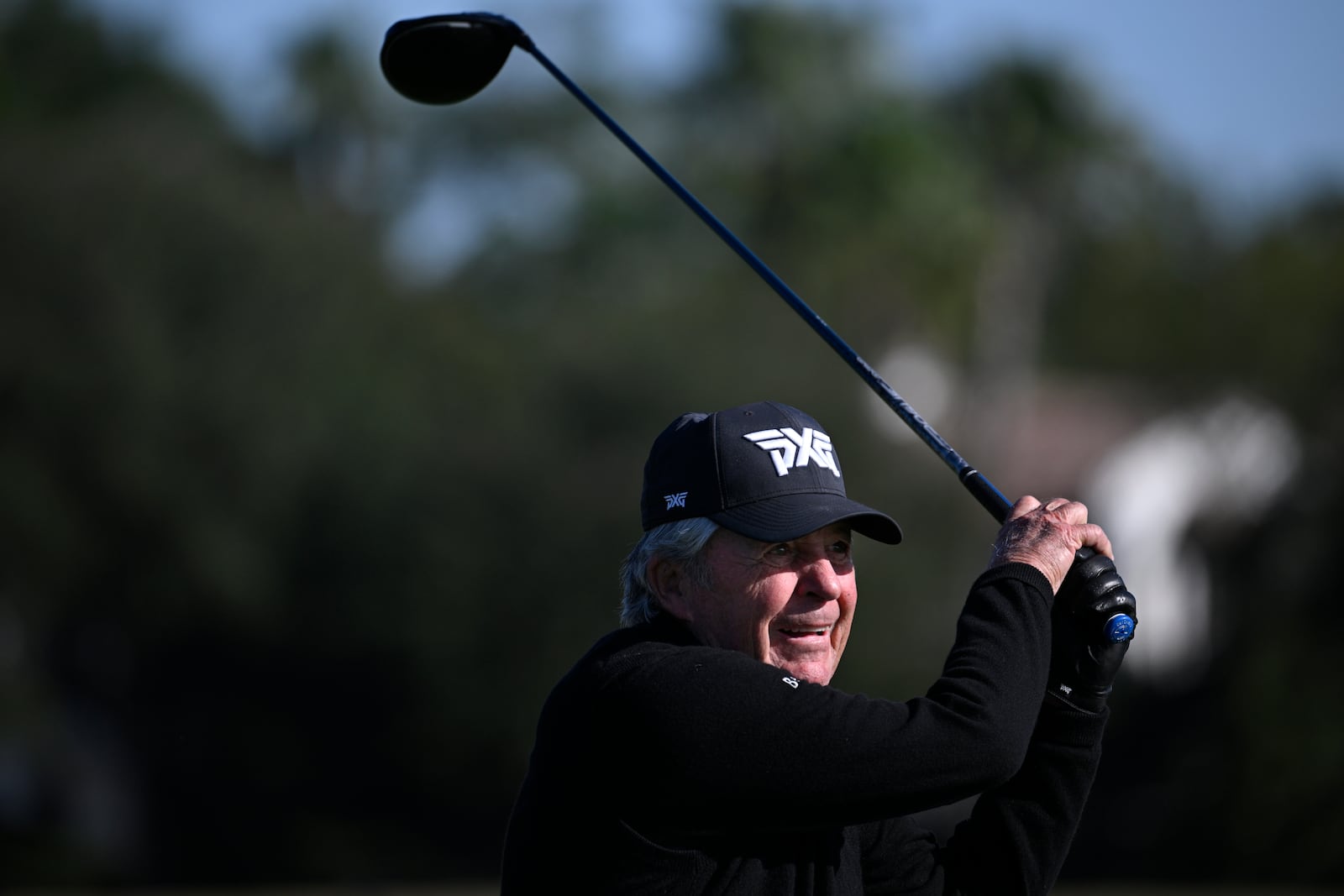 Gary Player, of South Africa, watches his tee shot on the fifth hole during the first round of the PNC Championship golf tournament, Saturday, Dec. 21, 2024 in Orlando. (AP Photo/Phelan M. Ebenhack)