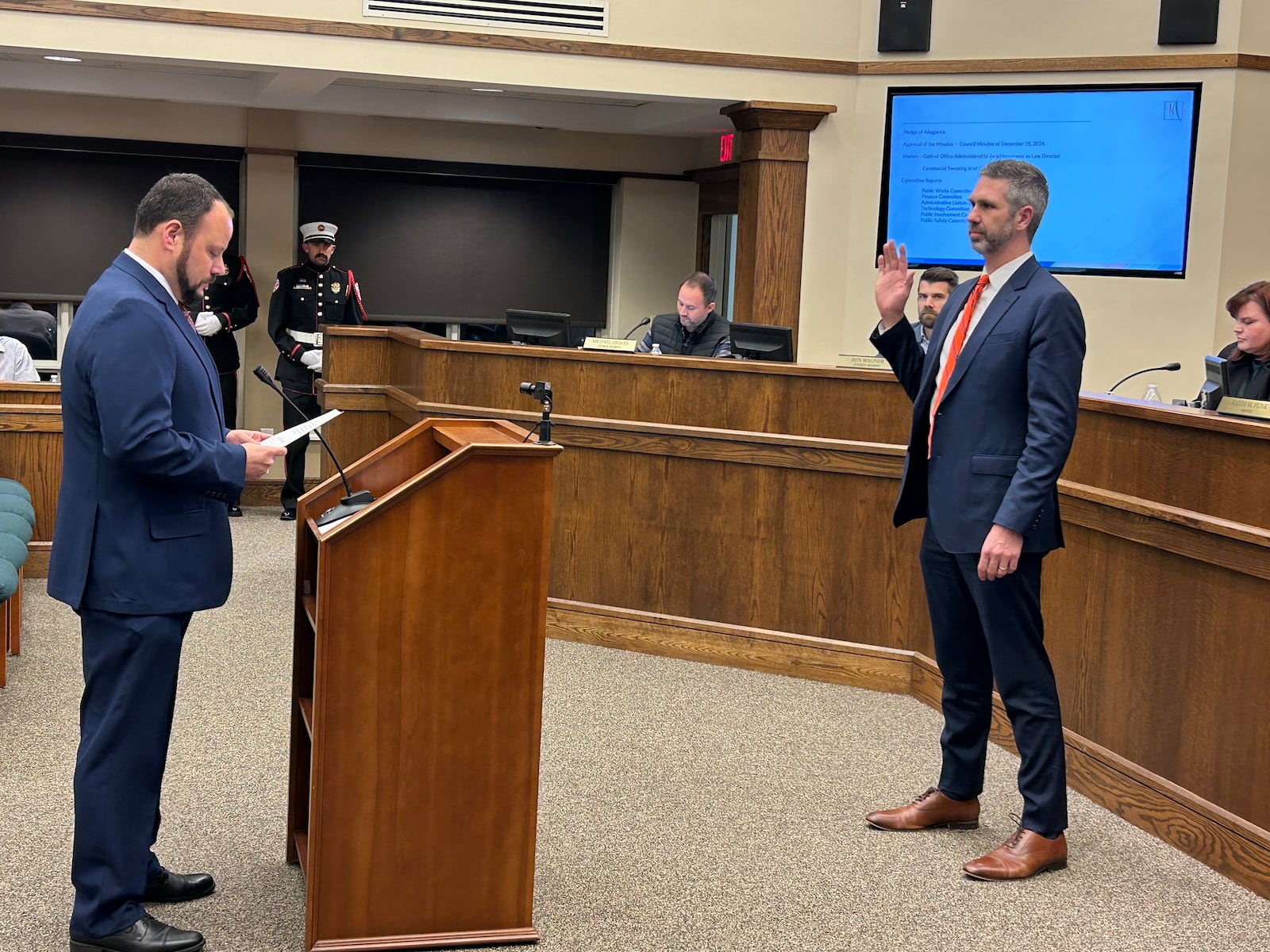 Monroe Mayor Keith Funk, left, swears in Jack B. Hemenway II as the city's new law director during Tuesday's City Council meeting. He replaces K. Philip Callahan who retired last month. RICK McCRABB/CONTRIBUTOR
