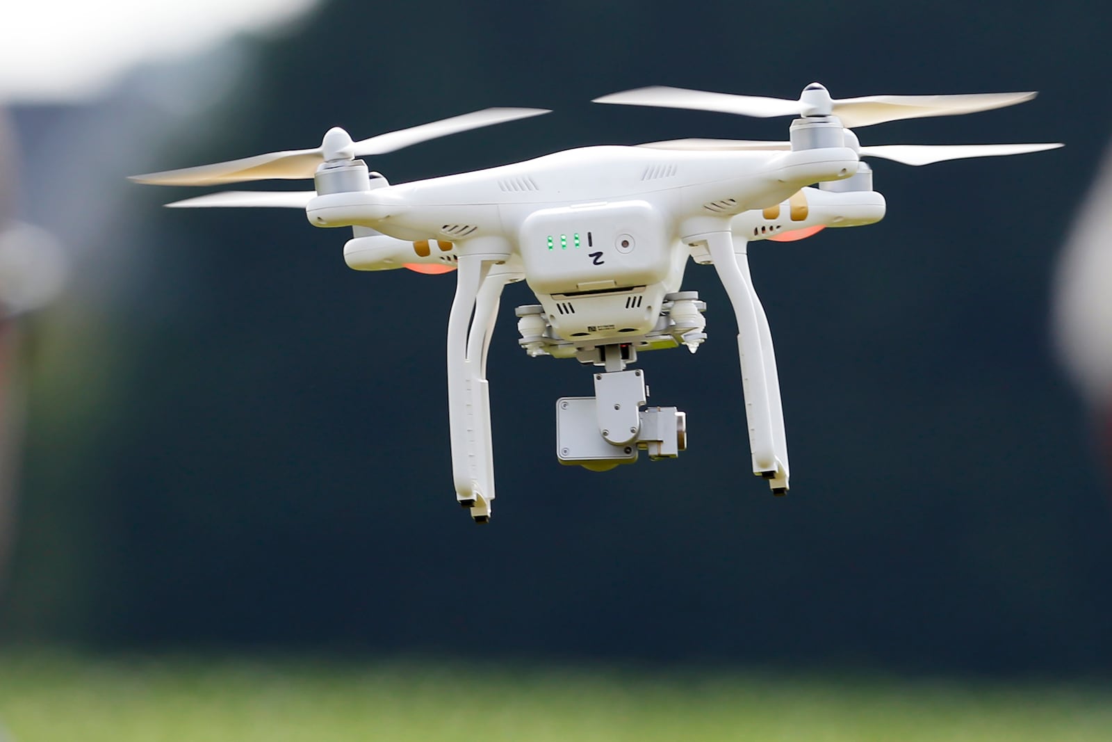 FILE - A DJI Phantom 3 drone flies during a drone demonstration at a farm and winery, June 11, 2015, in Cordova, Md. (AP Photo/Alex Brandon, File)