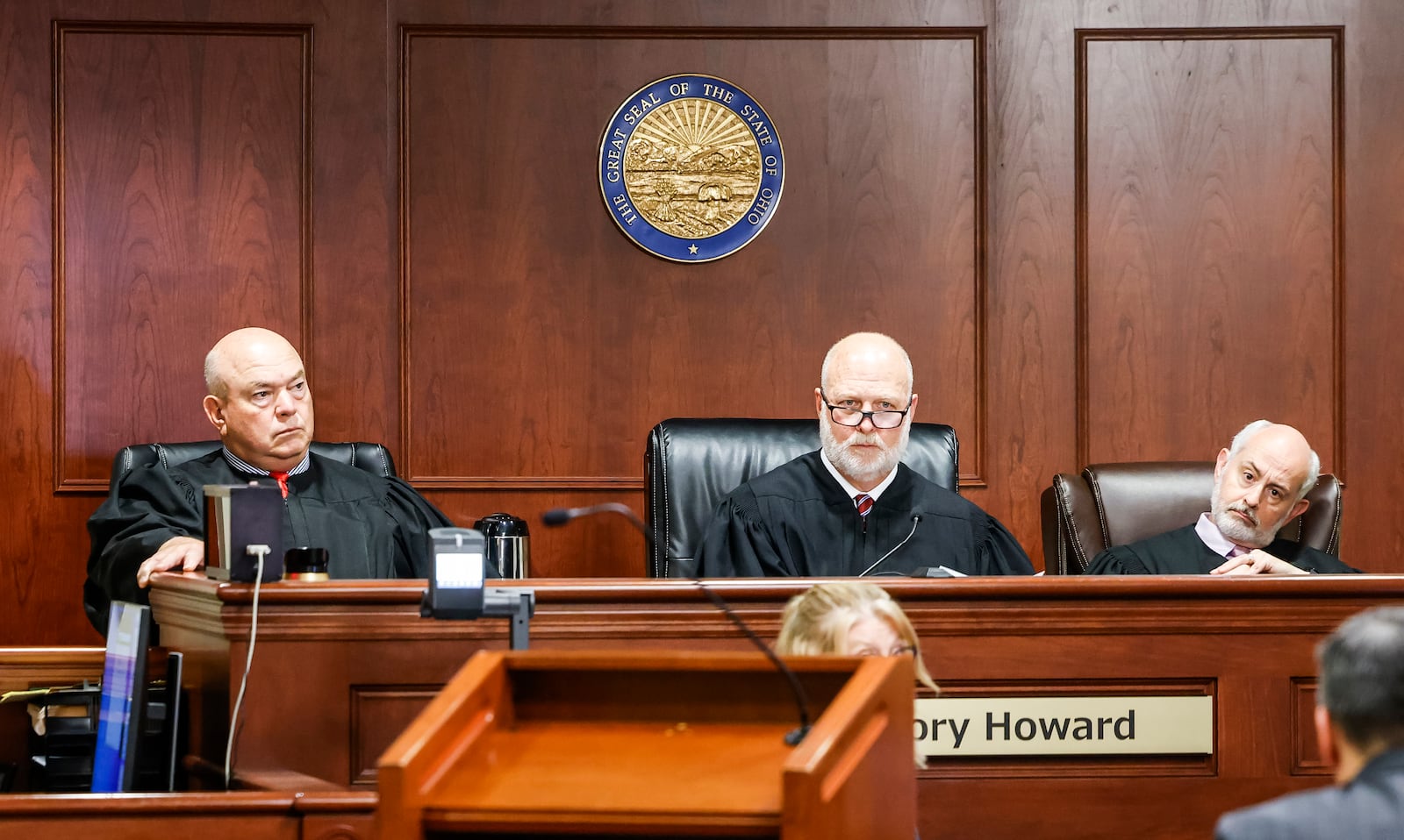 A three-judge panel made up of Butler county Common Pleas Court judges  Keith Spaeth, left, Gregory Howard, center, and Greg S. Stephens came back with a guilty verdict on all counts Friday, May 10, 2024  in the retrial of Gurpreet Singh, indicted in the deaths of four family members in 2019 in their West Chester home. NICK GRAHAM/STAFF