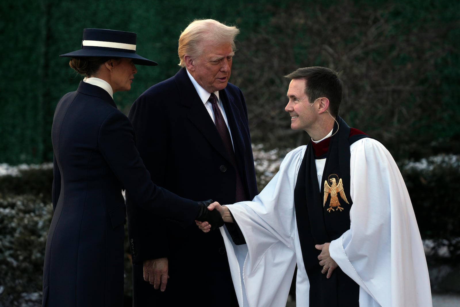 President-elect Donald Trump and his wife Melania are greeted as they arrive for church service at St. John's Episcopal Church across from the White House in Washington, Monday, Jan. 20, 2025, on Donald Trump's inauguration day. (AP Photo/Matt Rourke)