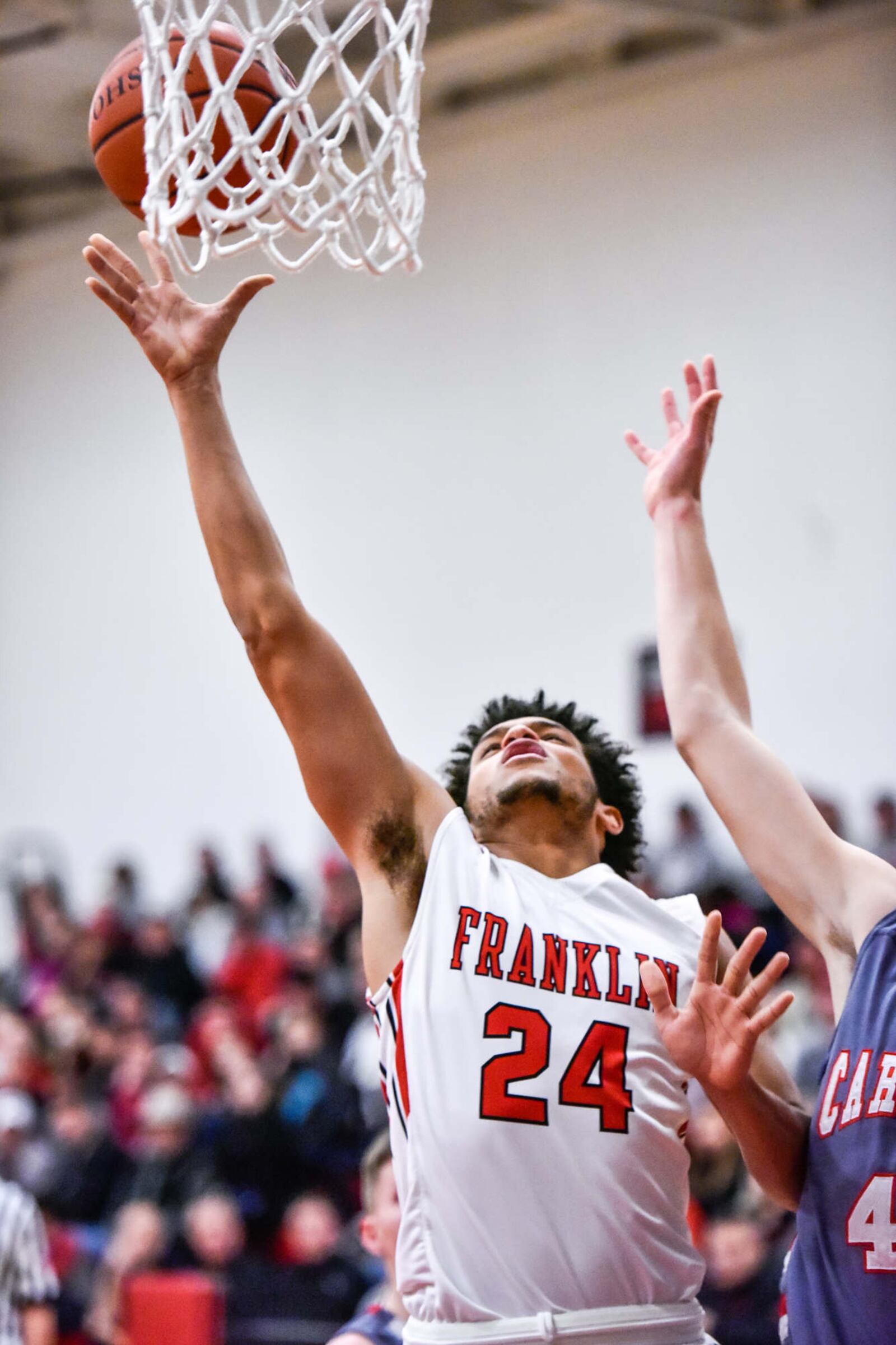 Franklin's Jayden Fitts eyes the basket during Tuesday night’s game against Carlisle at Darrell Hedric Gym in Franklin. NICK GRAHAM/STAFF