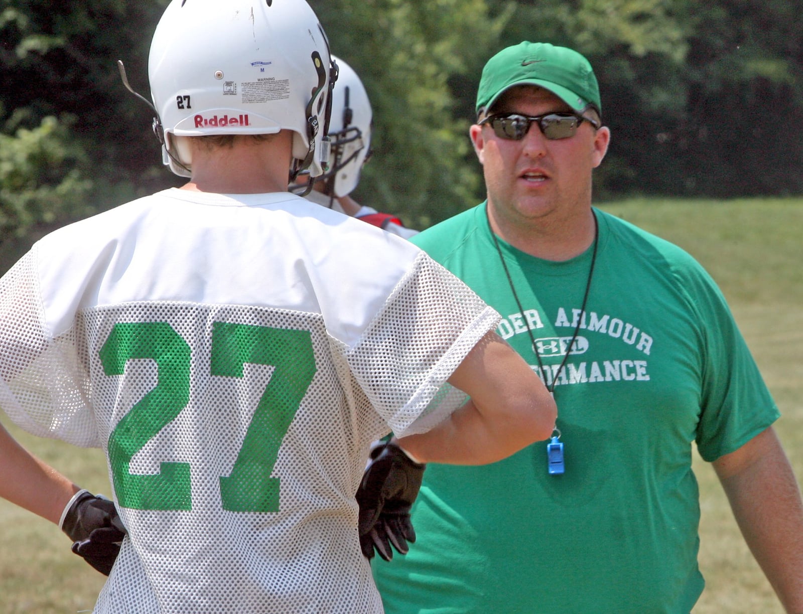 Dave Wirth coaches during a Badin High School football practice Aug. 3, 2007, at the school. GREG LYNCH/STAFF