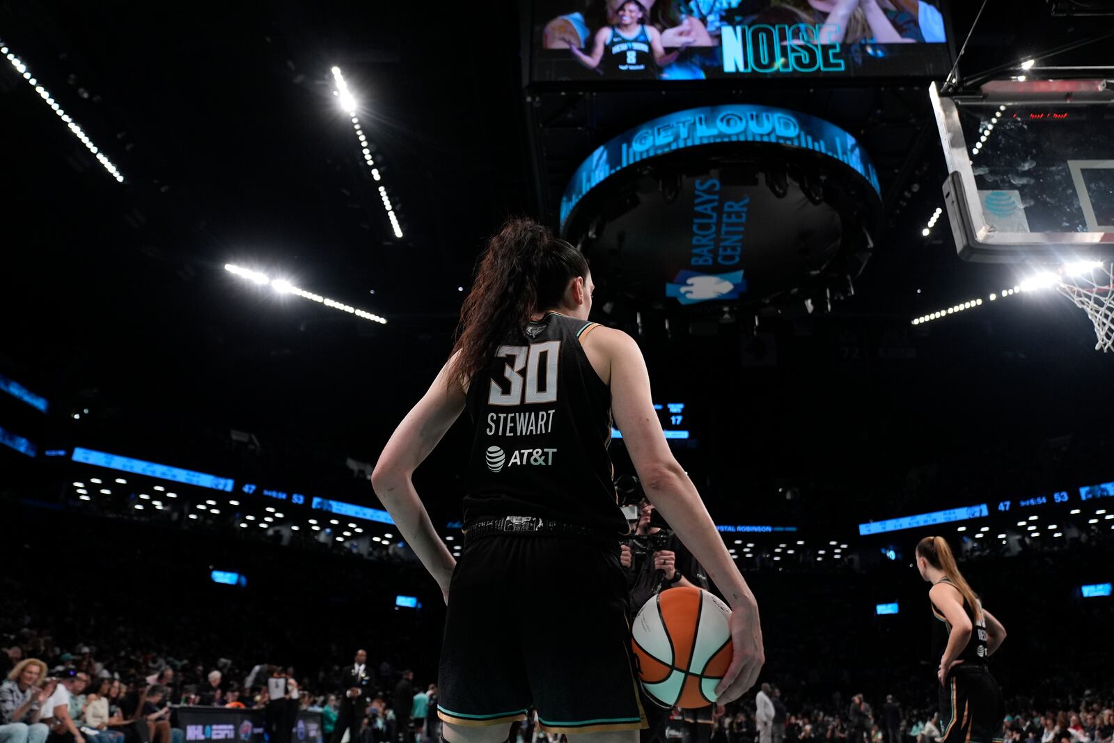 New York Liberty's Breanna Stewart stands on the court during the second half in Game 2 of a WNBA basketball final playoff series against the Minnesota Lynx, Sunday, Oct. 13, 2024, in New York. (AP Photo/Pamela Smith)