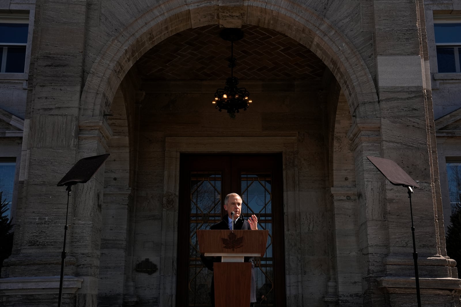 Prime Minister Mark Carney speaks to media at Rideau Hall, where he asked the Governor General to dissolve Parliament and call an election, in Ottawa, Sunday, March 23, 2025. (Adrian Wyld /The Canadian Press via AP)