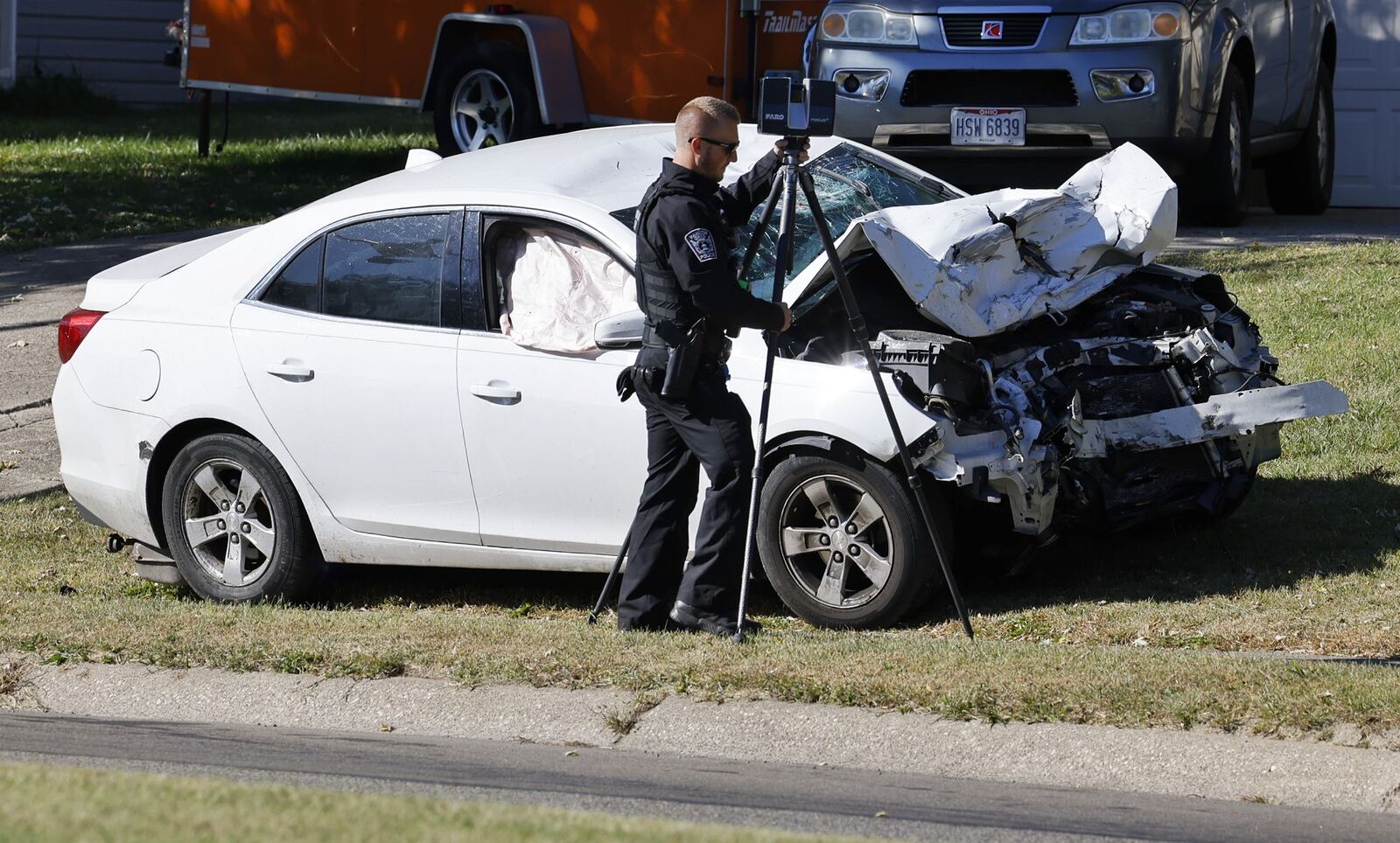 A white sedan was involved in a crash with a motorcycle on Roosevelt Boulevard in Middletown around 3 p.m. Saturday, Oct. 8, 2022. NICK GRAHAM/STAFF