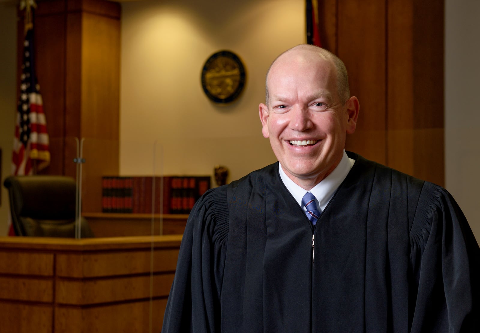 Erik Niehaus takes the bench after being elected as new Butler County Juvenile Division Common Pleas Judge replacing Judge Ronald Craft who could not run again due to age restrictions. NICK GRAHAM  / STAFF