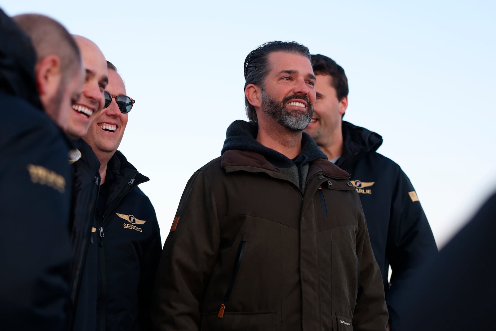 Donald Trump Jr., center, arrives in Nuuk, Greenland, Tuesday, Jan. 7, 2025. (Emil Stach/Ritzau Scanpix via AP)