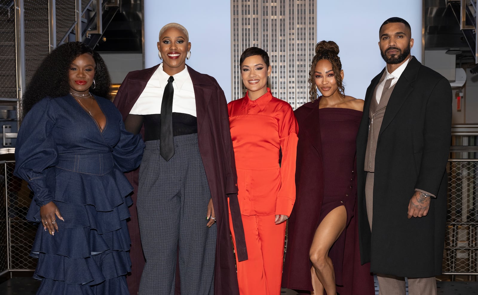 Shoniqua Shandai, from left, Jerrie Johnson, Grace Byers, Meagan Good, and Tyler Lepley from the cast of Prime Video's "Harlem" visit the Empire State Building on Tuesday, Jan. 14, 2025, in New York. (Photo by CJ Rivera/Invision/AP)