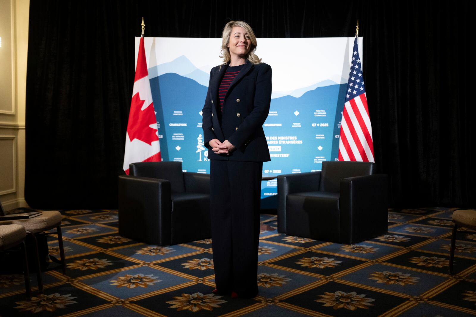 Canadian Foreign Minister Melanie Joly awaits the arrival of US Secretary of State Marco Rubio for a bilateral meeting on the sidelines of the G7 foreign ministers meeting in La Malbaie, Canada, Friday March 14, 2025. (Saul Loeb, Pool Photo via AP)