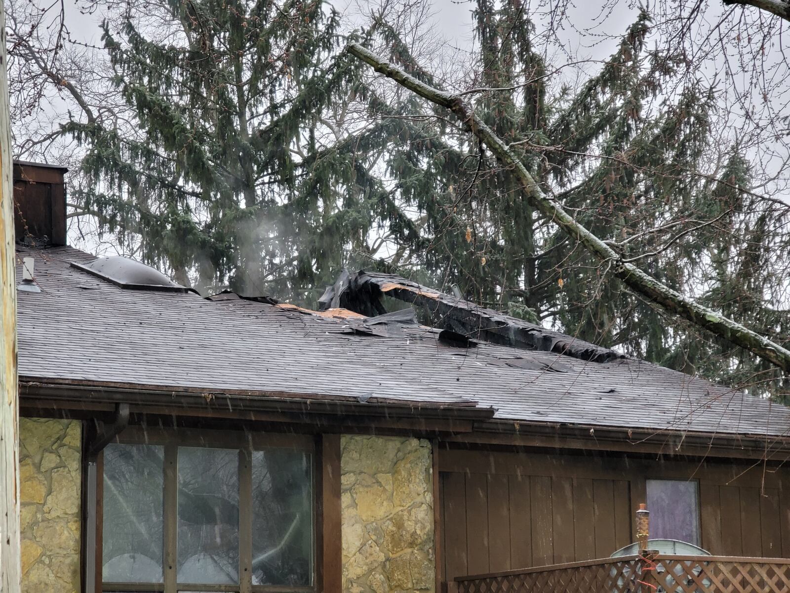 Fire broke out Wednesday morning displacing residents of a four-unit condo at Wilbraham Road and Carmody Boulevard in Middletown. NICK GRAHAM/STAFF