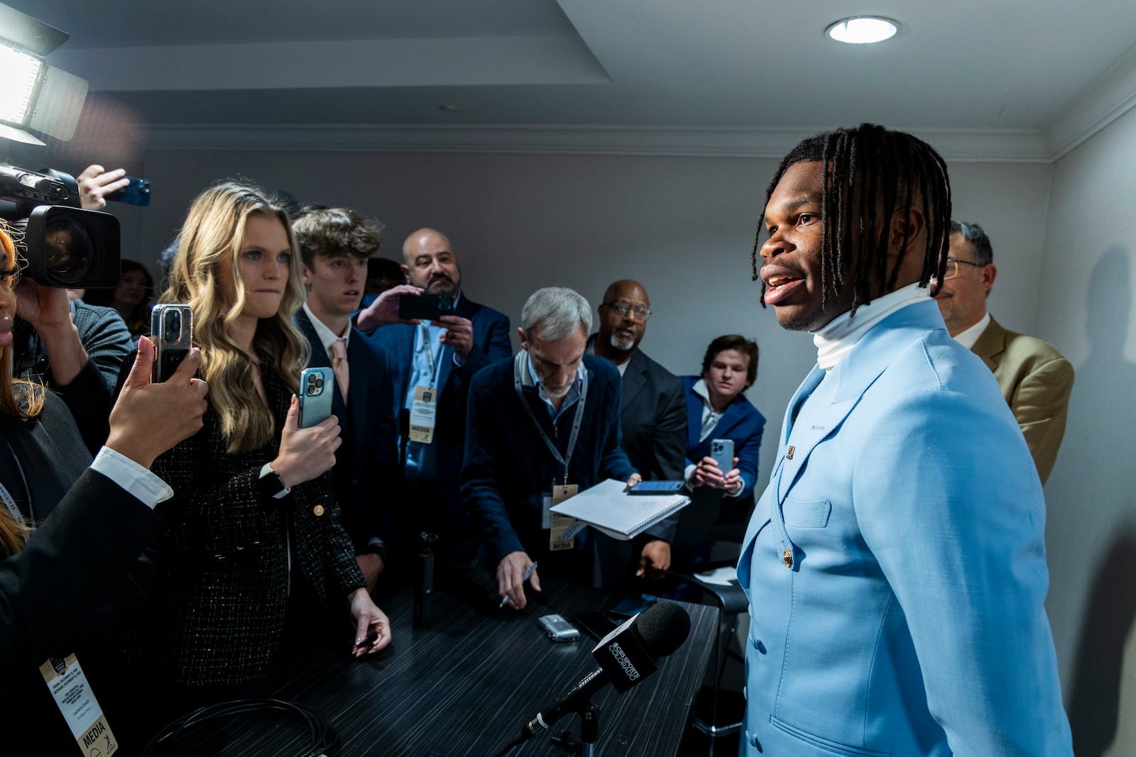 Heisman Trophy finalist Travis Hunter, of Colorado, speaks speaks at a college football press conference, Saturday, Dec. 14, 2024, in New York. (AP Photo/Corey Sipkin)