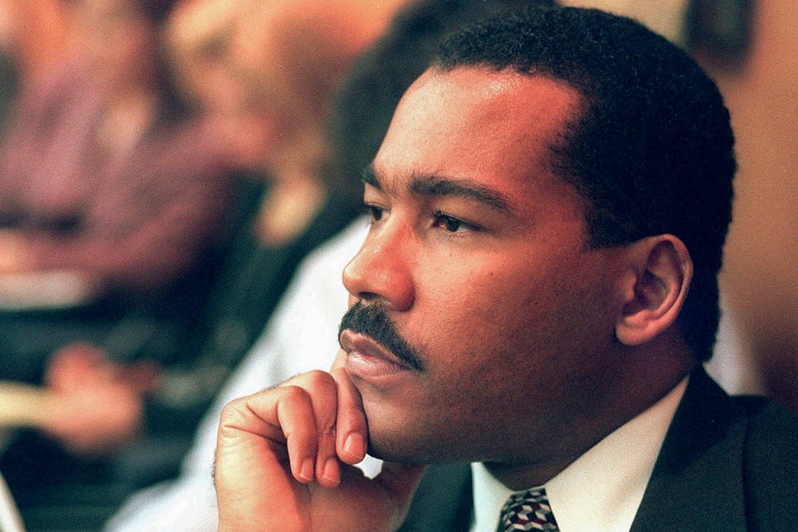 FILE - Dexter King, son of the late civil rights leader Martin Luther King Jr., listens to arguments in the State Court of Criminal Appeals in Jackson, Tenn., Aug. 29, 1997, to determine whether two Memphis judges have overstepped their authority surrounding the investigation of the King assassination. (Helen Comer/The Jackson Sun via AP, Pool, File)