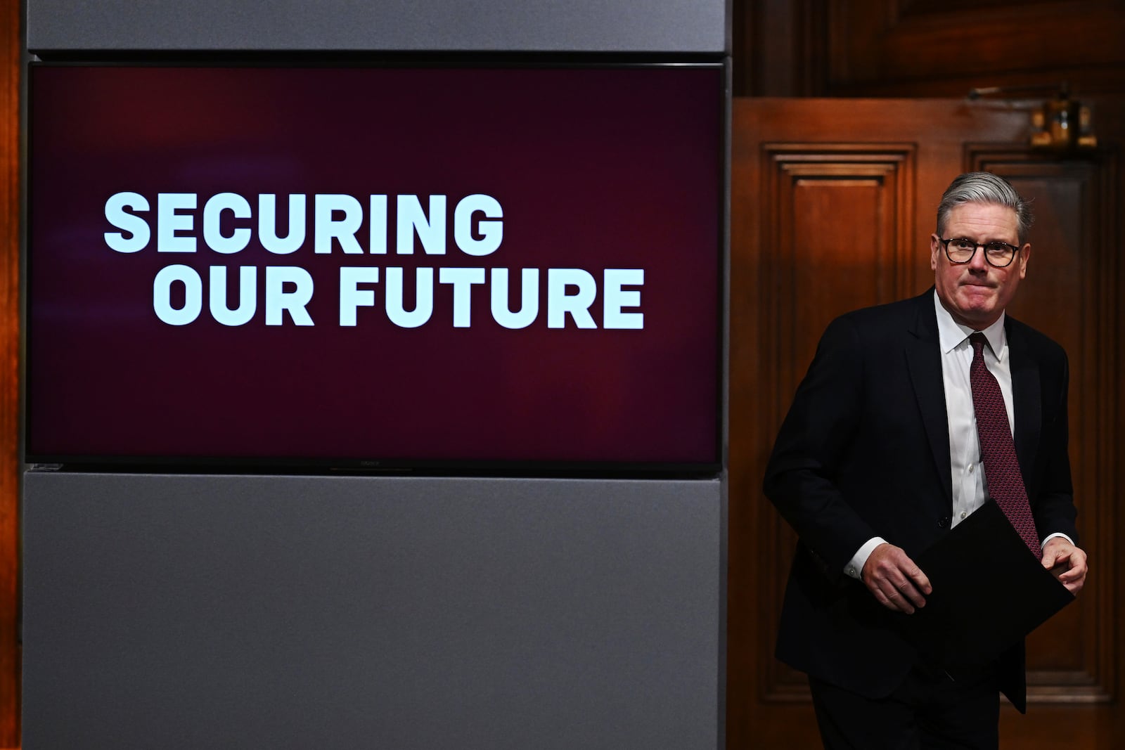 Britain's Prime Minister Keir Starmer arrives for a press conference following this morning's virtual summit video conference at 10 Downing Street in London, England, March 15, 2025. (Leon Neal/Pool Photo via AP)