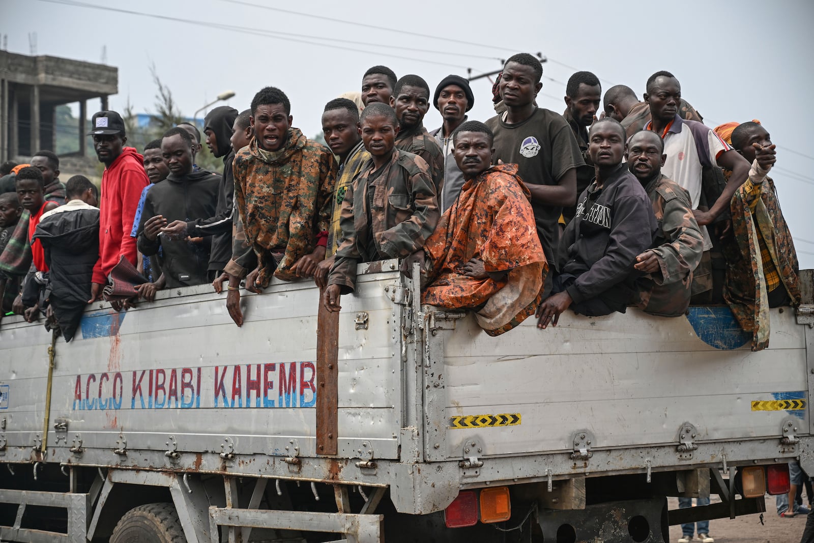 M23 rebels escort government soldiers and police who surrendered to an undisclosed location in Goma, Democratic republic of the Congo, Thursday, Jan. 30, 2025. (AP Photo/Moses Sawasawa)