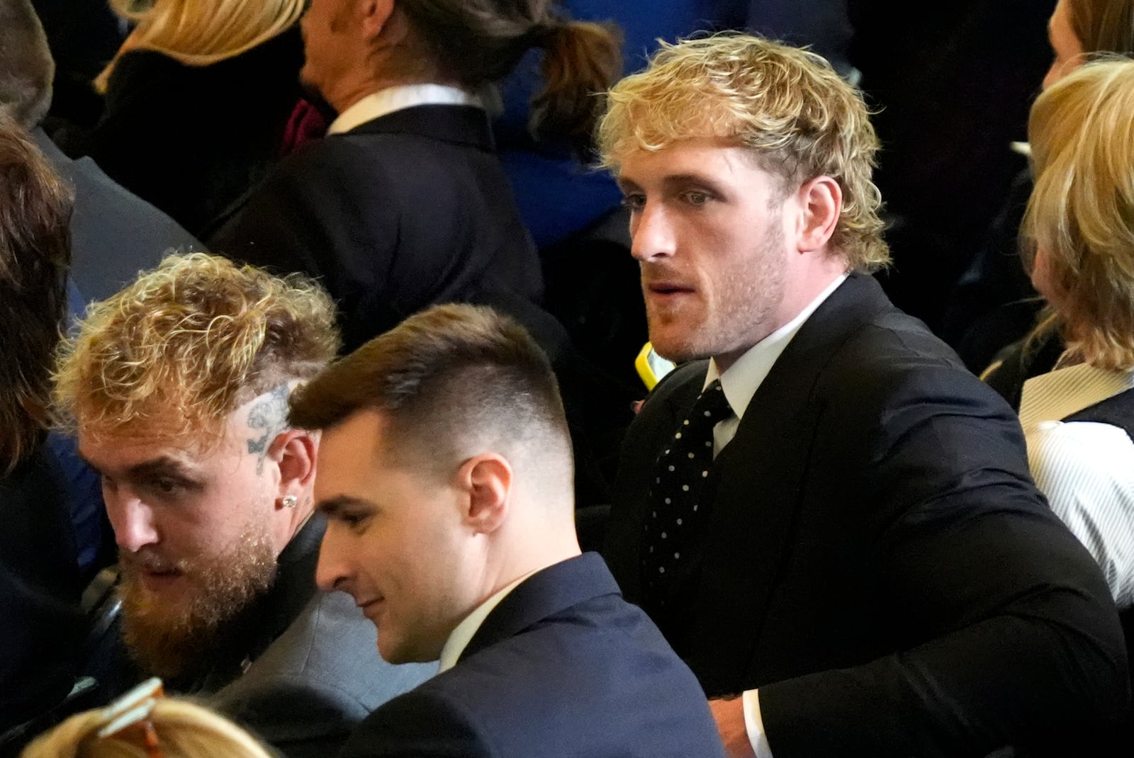 Logan Paul, right, and Jake Paul appear in Emancipation Hall at the 60th Presidential Inauguration, Monday, Jan. 20, 2025, at the U.S. Capitol in Washington. (Jasper Colt/Pool Photo via AP)