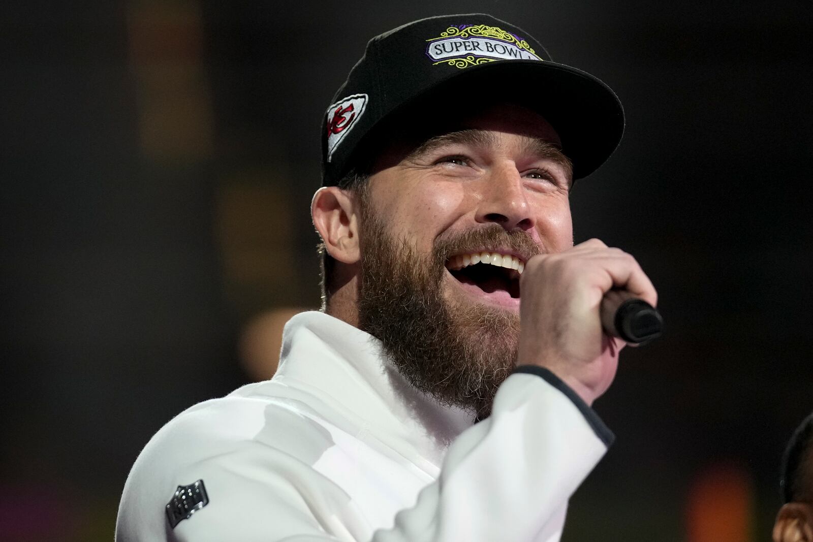 Kansas City Chiefs tight end Travis Kelce (87) participates during Super Bowl 59 Opening Night, Monday, Feb. 3, 2025, in New Orleans, ahead of the NFL football game between the Philadelphia Eagles and the Kansas City Chiefs Sunday. (AP Photo/Brynn Anderson )