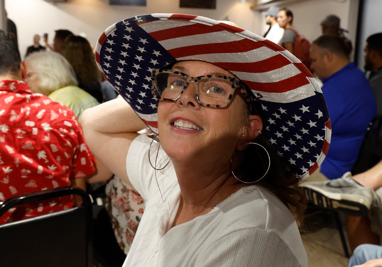 Sherri Newsome waits for former presidential candidate Vivek Ramaswamy to speak during a town hall meeting at the Bushnell Banquet Center in Springfield Thursday, Sept. 19, 2024. BILL LACKEY/STAFF