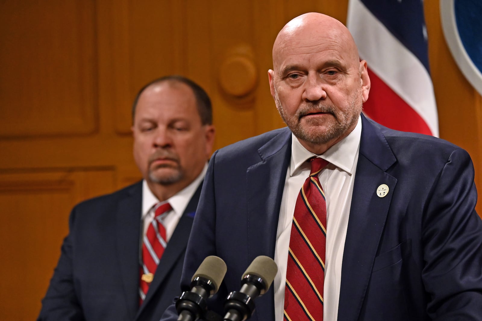 State Rep. Tom Young, R-Washington Twp., (right) discusses establishing a penalty for the mutilation of a deceased animal as part of legislation outlined at a press conference at the Ohio Statehouse in Columbus Wednesday, Nov. 15, 2023. Young was joined Sgt. Jeff Muncy of the Miamisburg Police Department (left), who thanked Young for putting the bill together after a Miamisburg student couldn't be charged for stabbing the corpse of a dog that was struck and killed by a vehicle. CONTRIBUTED