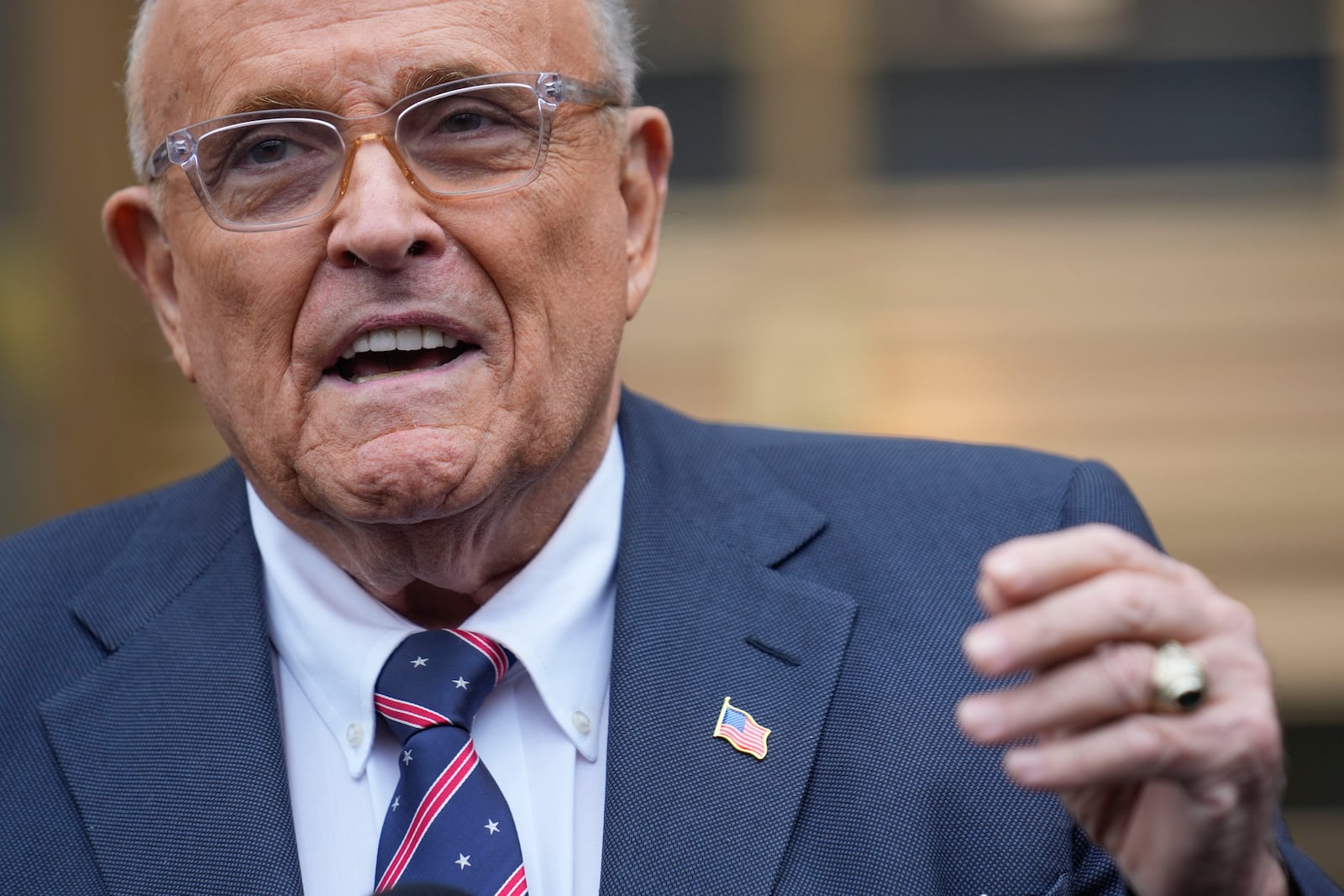 Rudy Giuliani speaks to reporters as he leaves the federal courthouse in New York, Tuesday, Nov. 26, 2024. (AP Photo/Seth Wenig)