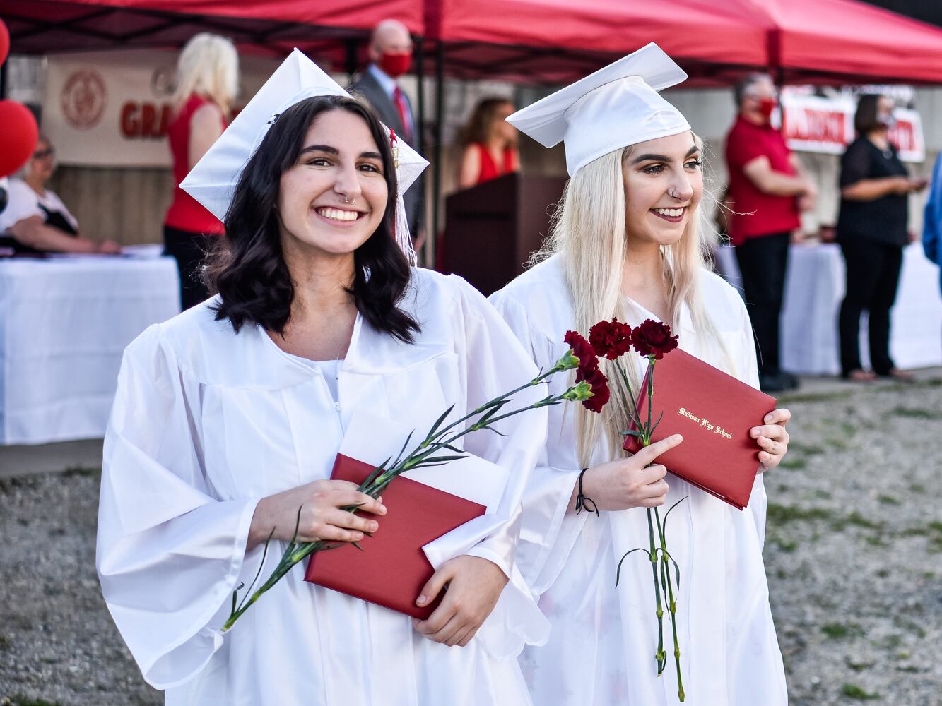 Madison High School drive-thru graduation ceremony at Land of Illusion