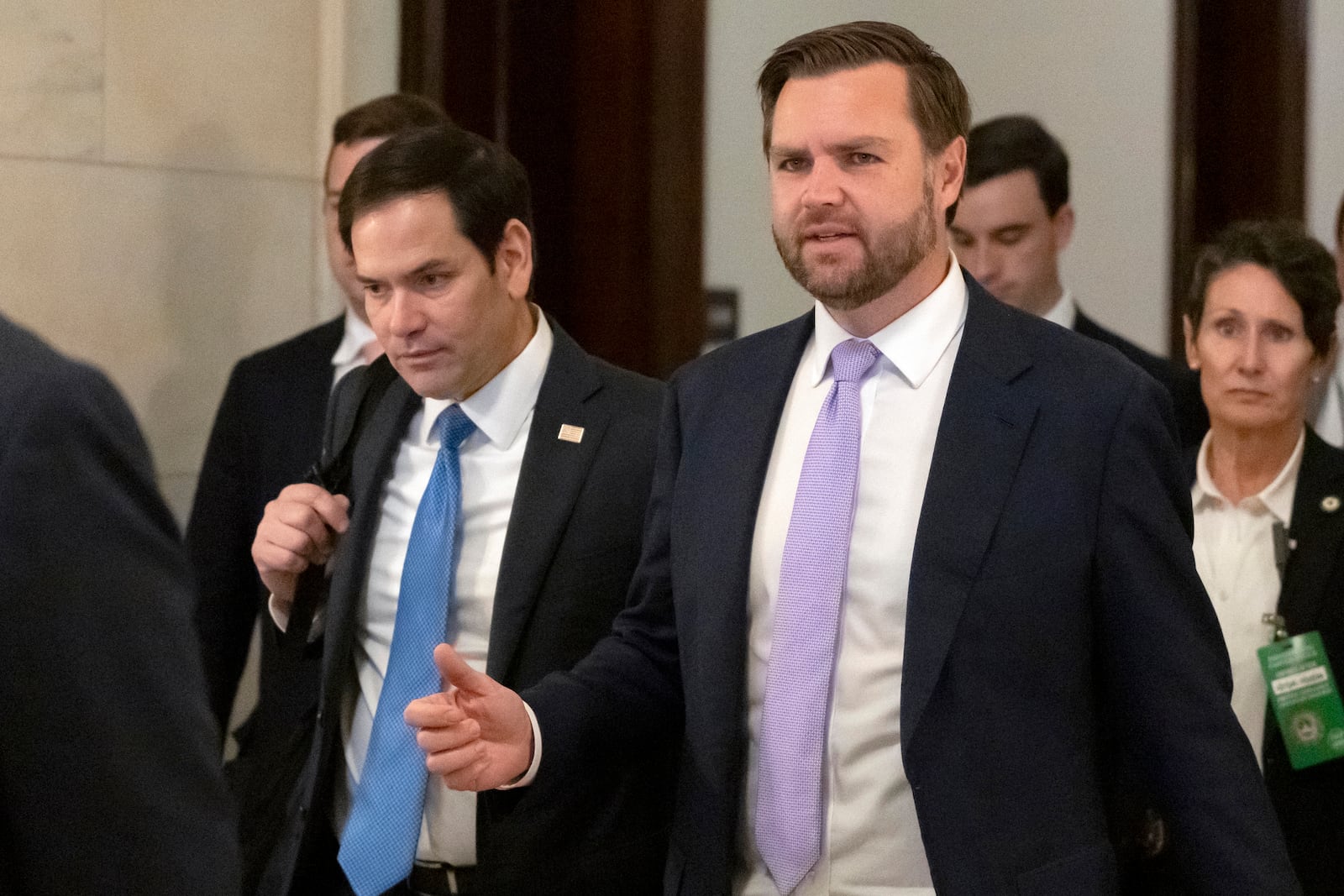 Sen. Marco Rubio, R-Fla., left, and Vice President-elect Sen. JD Vance, R-Ohio, walk together after leaving Vance's office on Capitol Hill, Thursday, Nov. 21, 2024, in Washington. (AP Photo/Mark Schiefelbein)