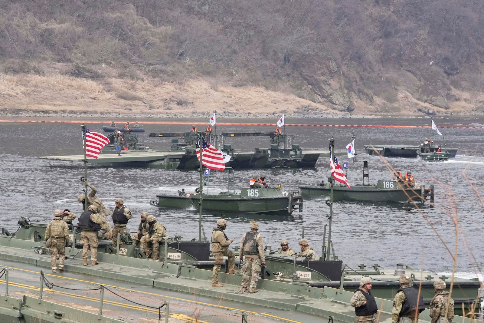 U.S. and South Korean army soldiers participate in a joint river-crossing exercise between South Korea and the United States as a part of the Freedom Shield military exercise on the Imjin River in Yeoncheon, South Korea, Thursday, March 20, 2025. (AP Photo/Ahn Young-joon)