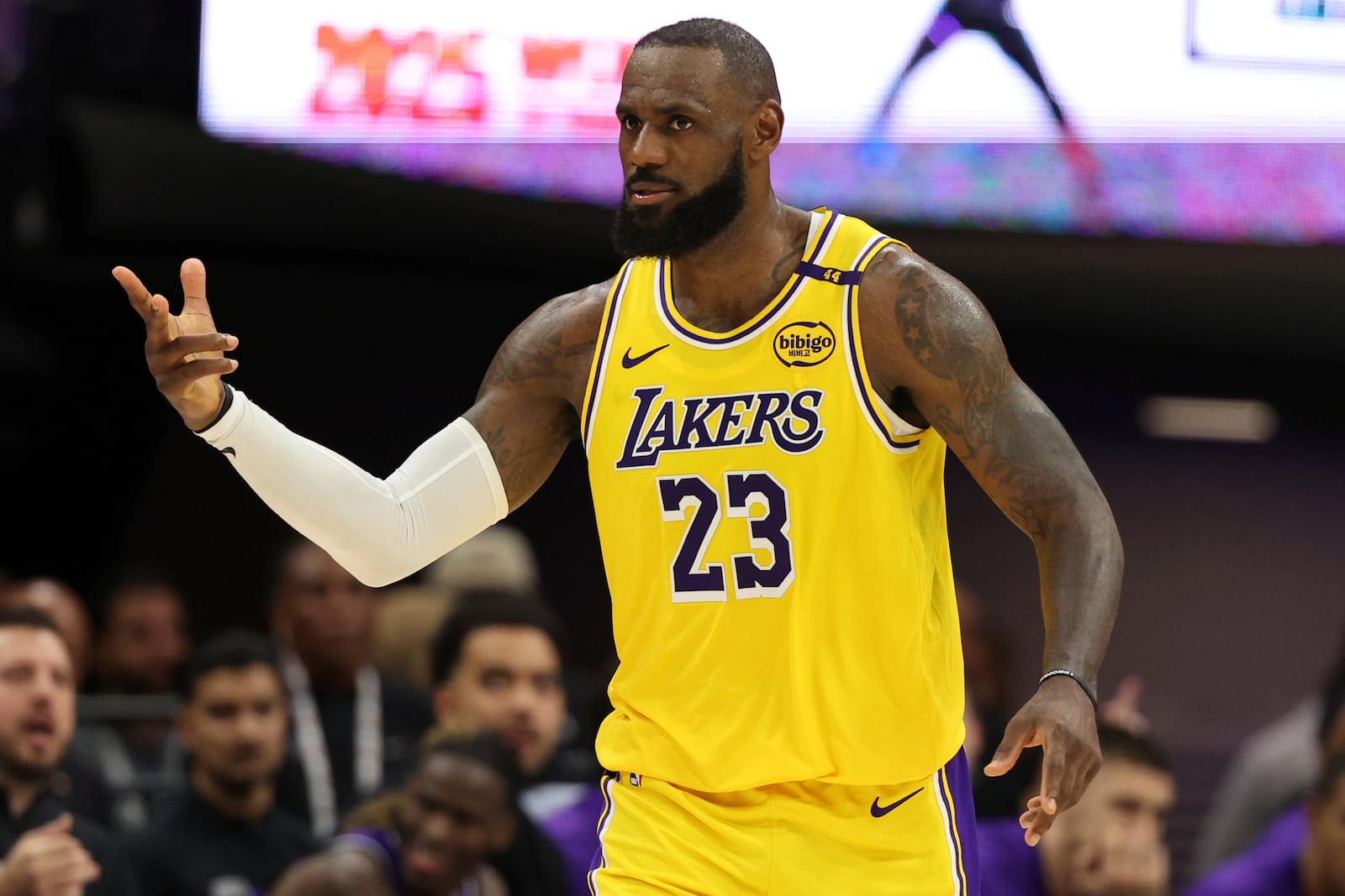 Los Angeles Lakers forward LeBron James (23) celebrates after scoring against the Sacramento Kings during the second half of an NBA basketball game in Sacramento, Calif., Thursday, Dec. 19, 2024. (AP Photo/Jed Jacobsohn)