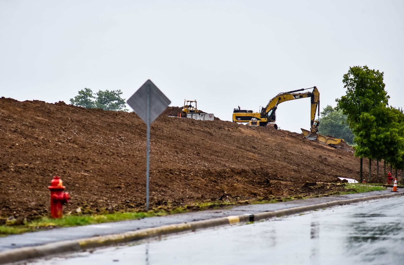 Work on the $50 million development known as Fairfield Commerce Park at the former Liberty Mutual property on Seward Road progresses. Property owner Ambrose Property Group aims to fill the employment void created by Liberty Mutual leaving Fairfield with hundreds of jobs. Ambrose Property plans to lease buildings to companies looking for space. Ambrose Property plans to build two new buildings with the possibility of others being built in the coming years. NICK GRAHAM/STAFF