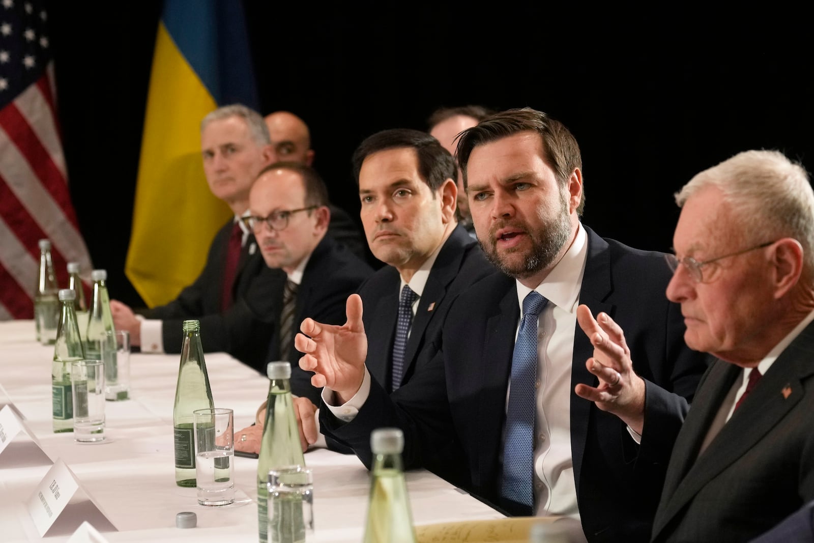 United States Vice-President JD Vance, second right, and United States Secretary of State Marco Rubio, center, meet with Ukraine's President Volodymyr Zelenskyy during a bilateral meeting on the sidelines of the Munich Security Conference in Munich, Germany, Friday, Feb. 14, 2025. (AP Photo/Matthias Schrader)