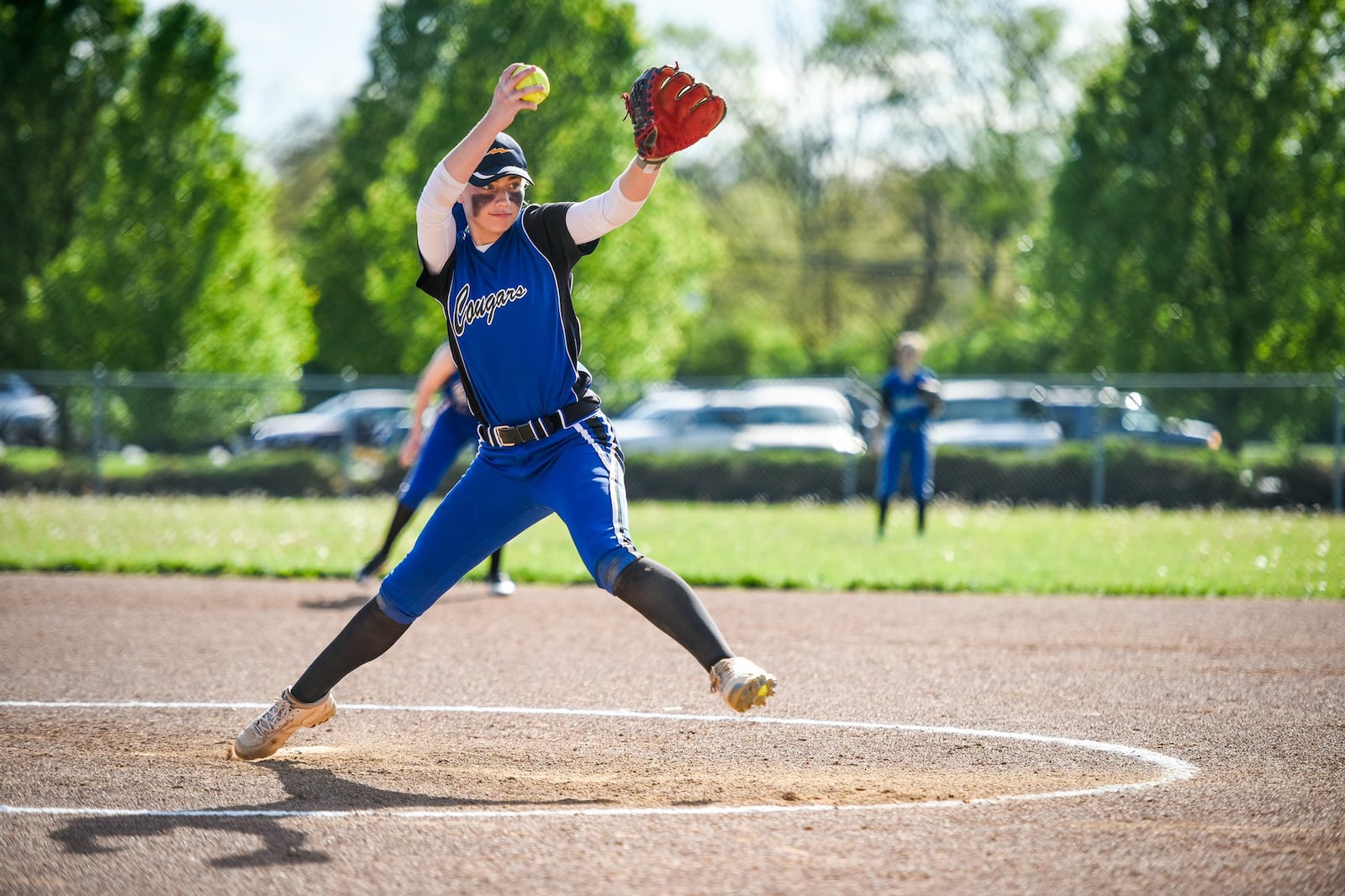 Cincinnati Christian’s Jenna Monk throws a pitch during a game at New Miami on April 24. NICK GRAHAM/STAFF