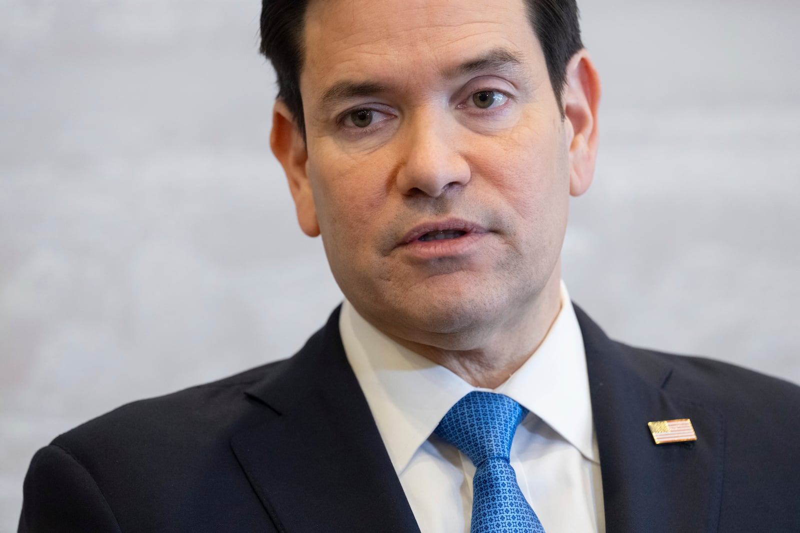 US Secretary of State Marco Rubio speaks to the media during a refueling stop at Shannon Airport in Shannon, Ireland, on Wednesday, March 12, 2025. (Saul Loeb/Pool Photo via AP)