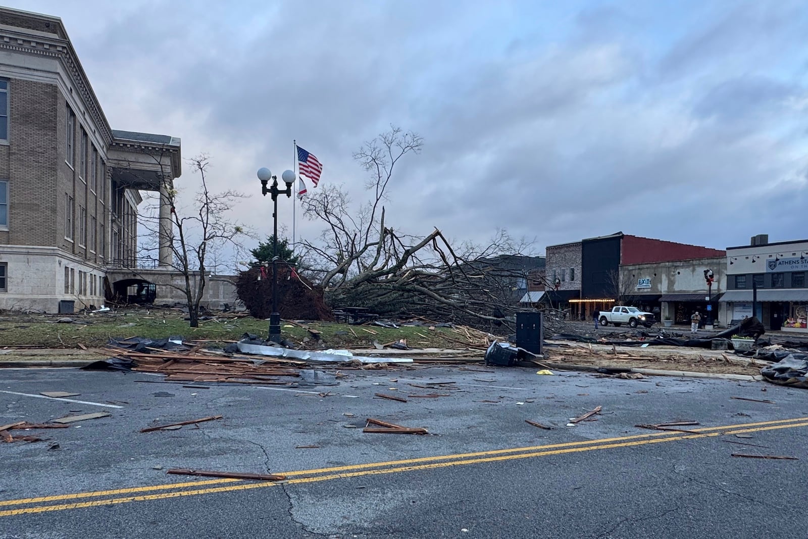 Damage from a storm through that rolled through the night before is seen at the heart of downtown on Sunday, Dec. 29, 2024, in Athens, Ala. (AP Photo/Lance George)