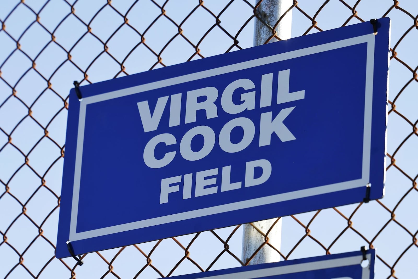 Virgil Cook, a lifelong Hamilton resident who has coached baseball and softball for over 30 years in Lindenwald, had a field (diamond 9) dedicated in his honor at Joyce Park Thursday, April 14, 2022 in Hamilton. NICK GRAHAM/STAFF