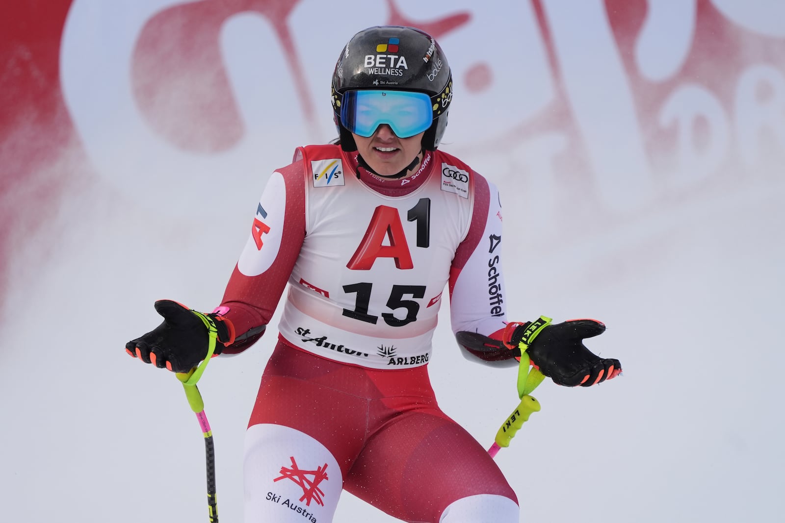 Austria's Stephanie Venier reacts after completing an alpine ski, women's World Cup super G race, in St. Anton, Austria, Sunday, Jan. 12, 2025. (AP Photo/Giovanni Auletta)