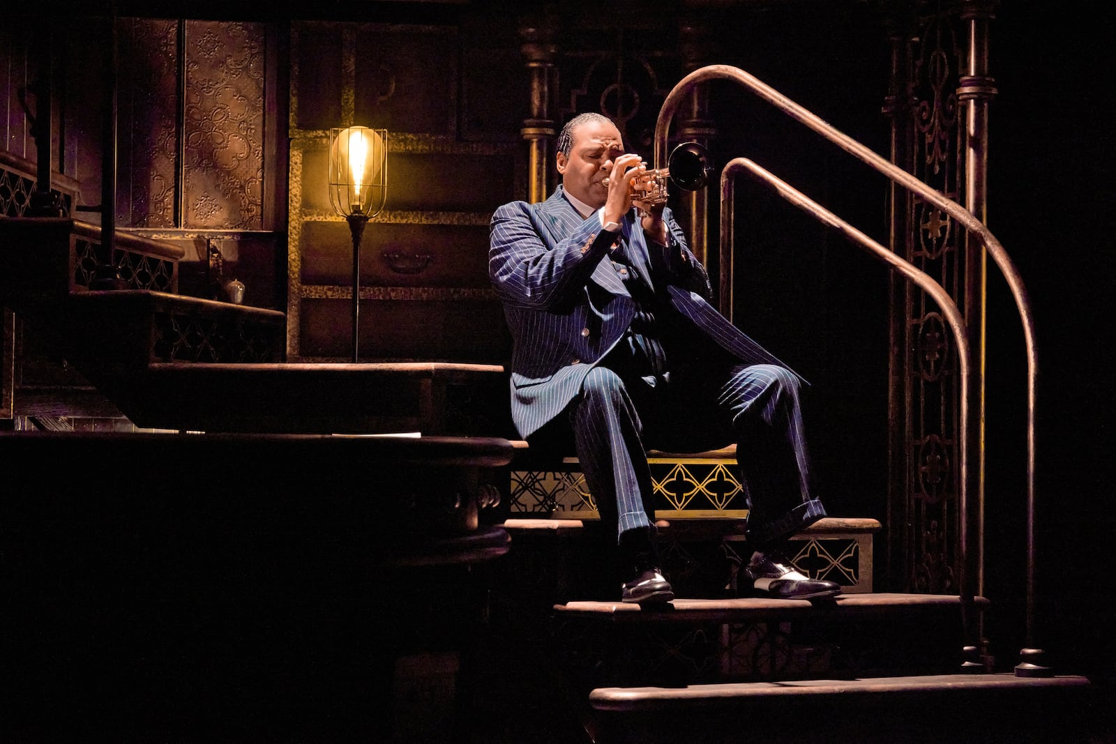 James Monroe Iglehart portrays Louis Armstrong during a performance in "A Wonderful World: The Louis Armstrong Musical" in New York. (Jeremy Daniel via AP)