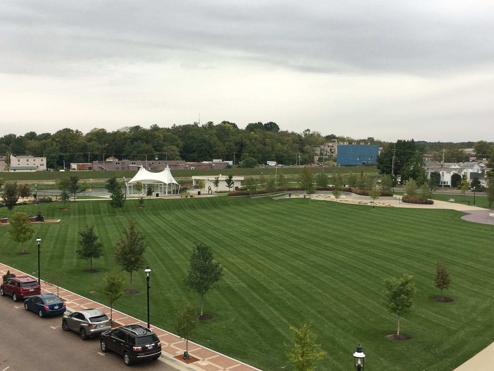 This is a view of Hamilton’s Marcum Park from a fourth-story apartment at The Marcum development of housing, restaurants and other retail. MIKE RUTLEDGE/STAFF