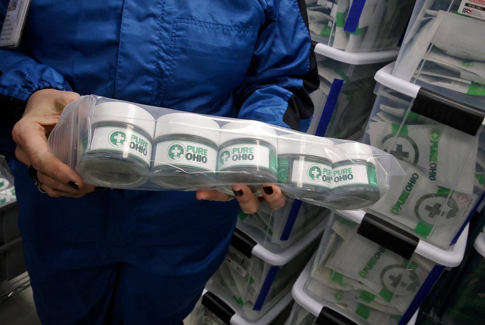 Some of the packaged cannibus ready for the dispensary Monday, Dec. 4, 2023 at the Pure Ohio Wellness production facility in Clark County. BILL LACKEY/STAFF