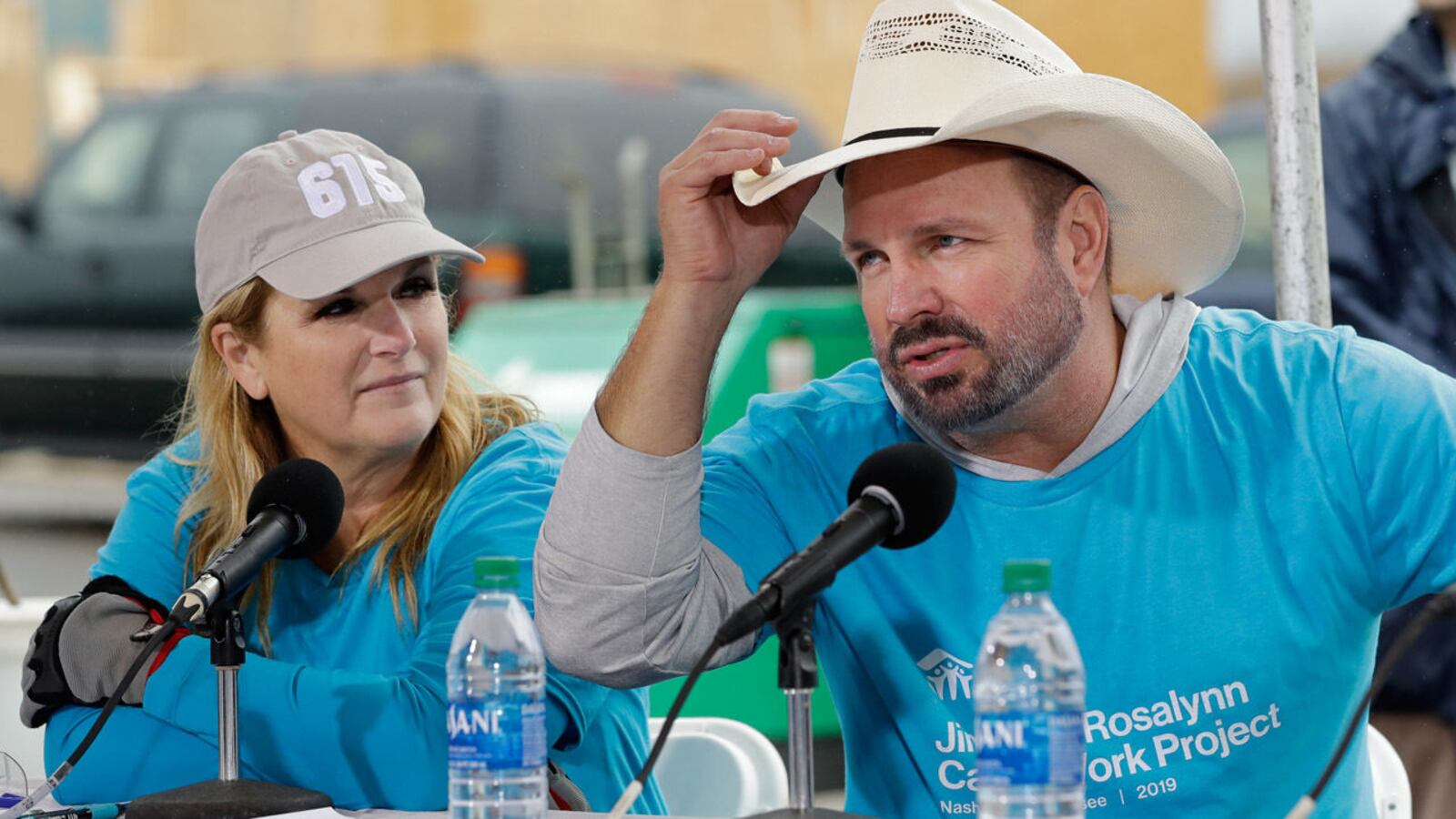 Country music stars Garth Brooks and Trisha Yearwood speak during a news conference at a Habitat for Humanity building project Monday, Oct. 7, 2019, in Nashville, Tenn.