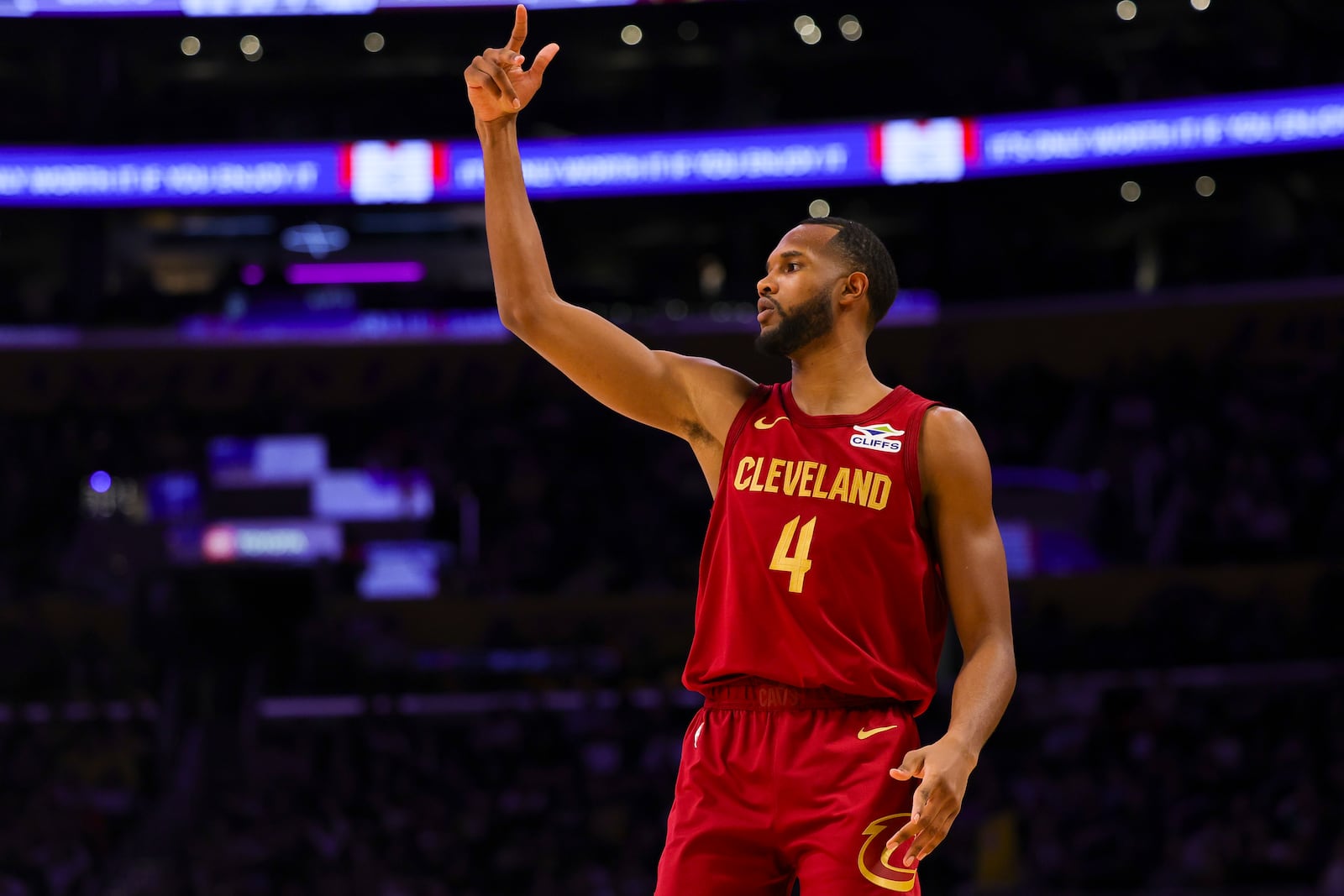 Cleveland Cavaliers forward Evan Mobley gestures after a 3-point basket during the first half of an NBA basketball game against the Los Angeles Lakers, Tuesday, Dec. 31, 2024, in Los Angeles. (AP Photo/Ryan Sun)