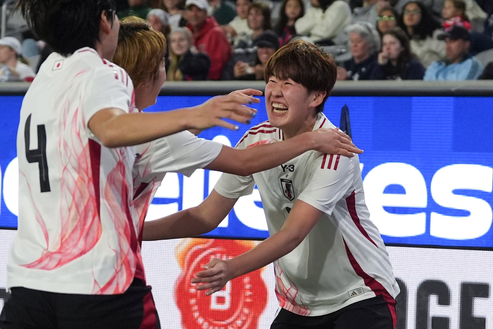 Japan defender Toko Koga, right, celebrates with teammates after scoring a goal against the United States during the second half of a SheBelieves Cup women's soccer tournament match Wednesday, Feb. 26, 2025, in San Diego. (AP Photo/Gregory Bull)