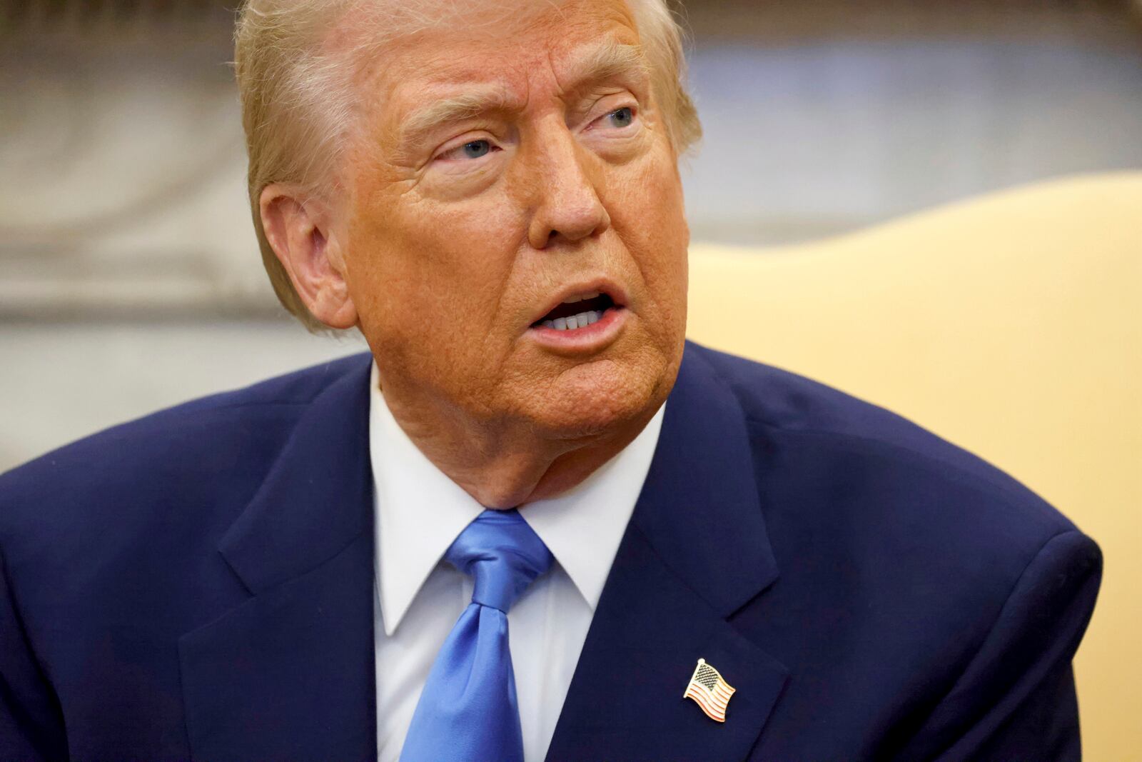 President Donald Trump speaks during a meeting with France's President Emmanuel Macron in the Oval Office of the White House in Washington, Monday, Feb. 24, 2025. (Ludovic Marin/Pool via AP)