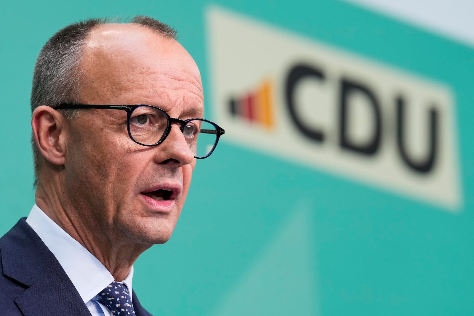 Friedrich Merz, leader of the Christian Democratic Union (CDU), speaks during a news conference at the headquarters of Christian Democratic Union (CDU) party in Berlin, Germany, Monday, Feb. 24, 2025. (AP Photo/Martin Meissner)